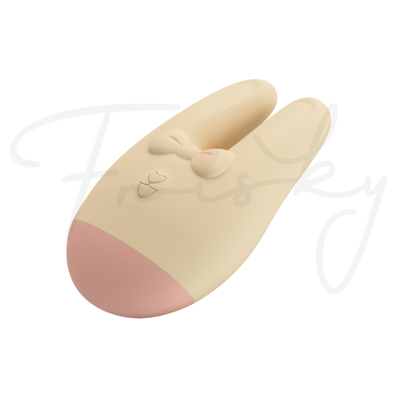 Cream bunny-ear vibrator with pink tip on a plain white background