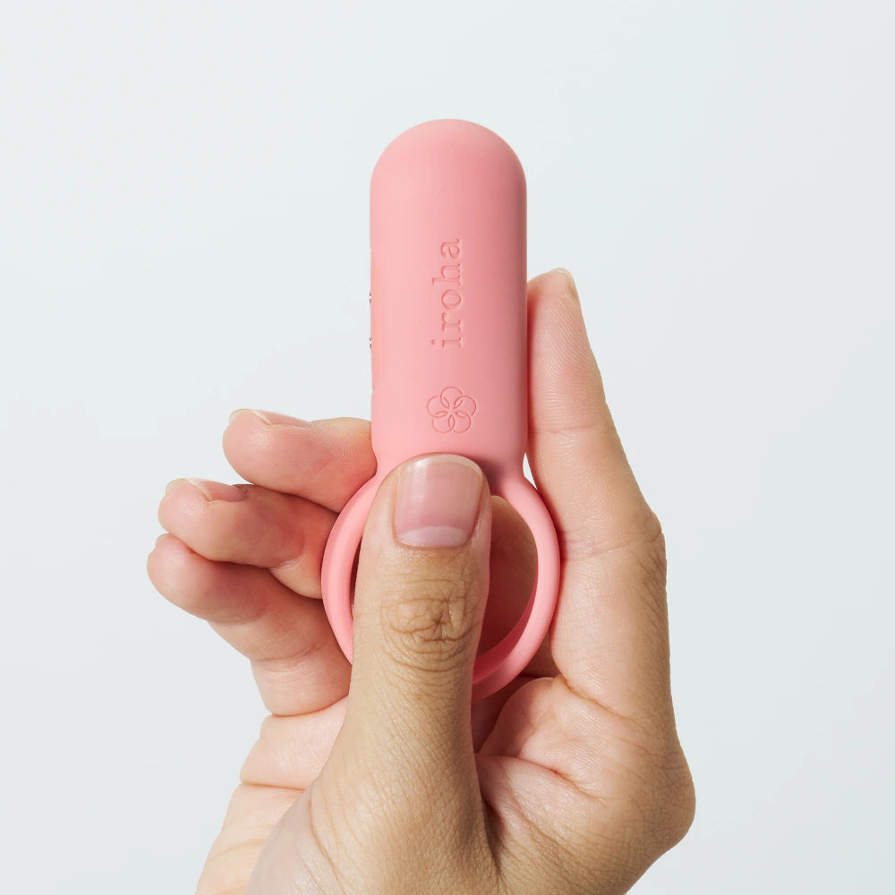 Side view of pink ring vibrator highlighting flexible loop and body shape