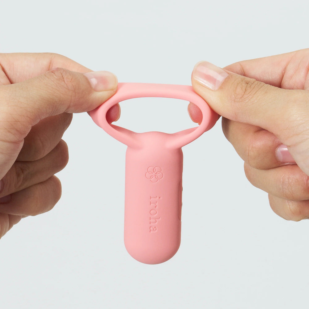 Two hands stretching flexible ring loop to demonstrate elasticity and durability