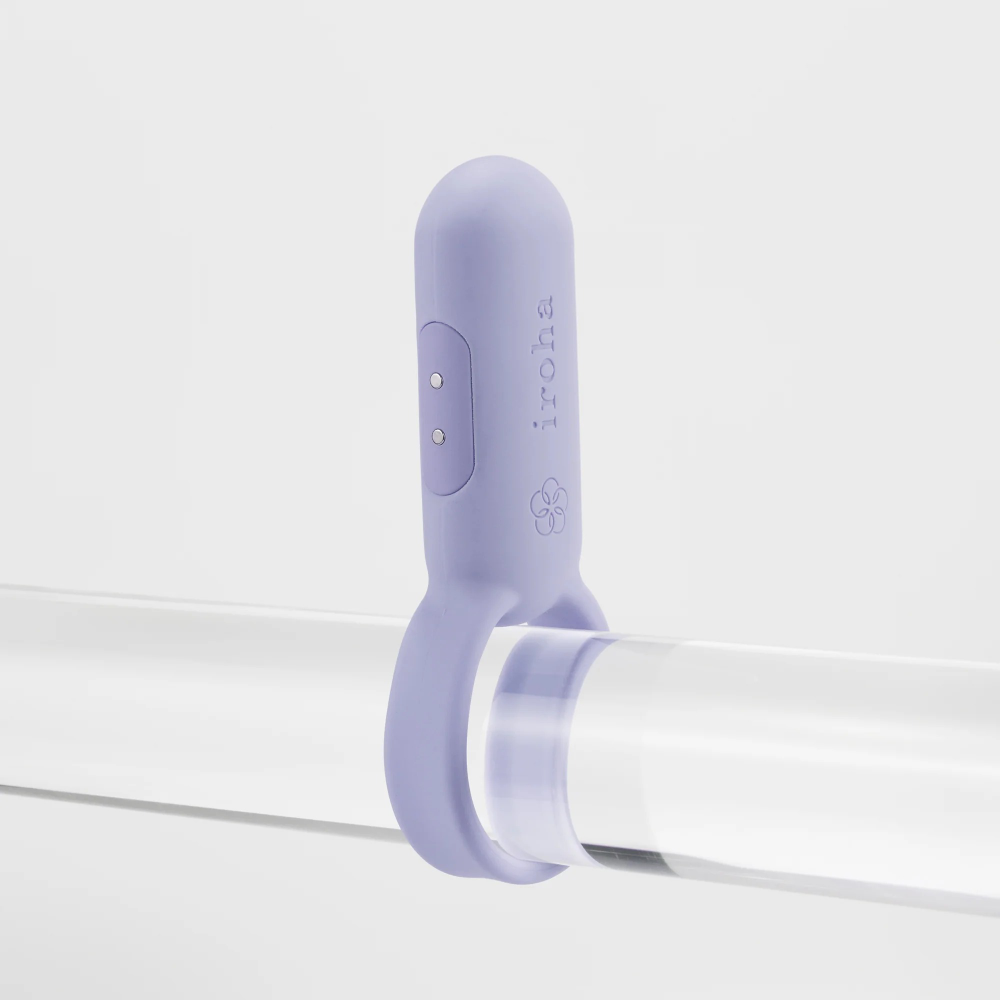 Vibrating ring placed on shaft demonstrating proper positioning for enhanced shared stimulation