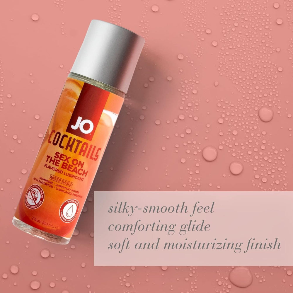 Bottle of JO Cocktails Sex on the Beach lubricant on a pink background with product description text.