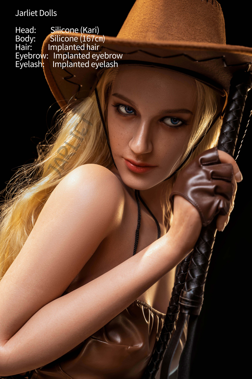 Jarliet Doll 167 cm B Silicone - Kari, wearing a cowboy hat and leather gloves while holding a whip, highlighting her detailed facial features and implanted hair.