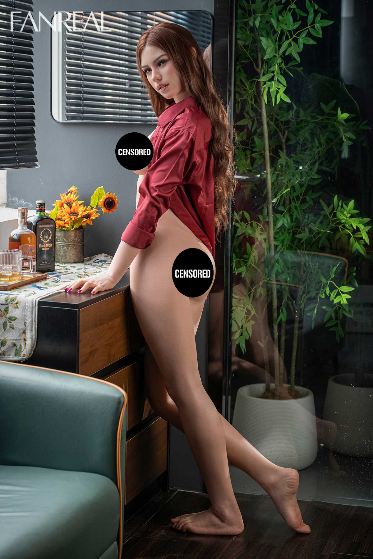 FANREAL DOLL 175 CM D Silicone - Mirella wearing a red sexy satin shirt in a side-standing pose, with a plant in the background.