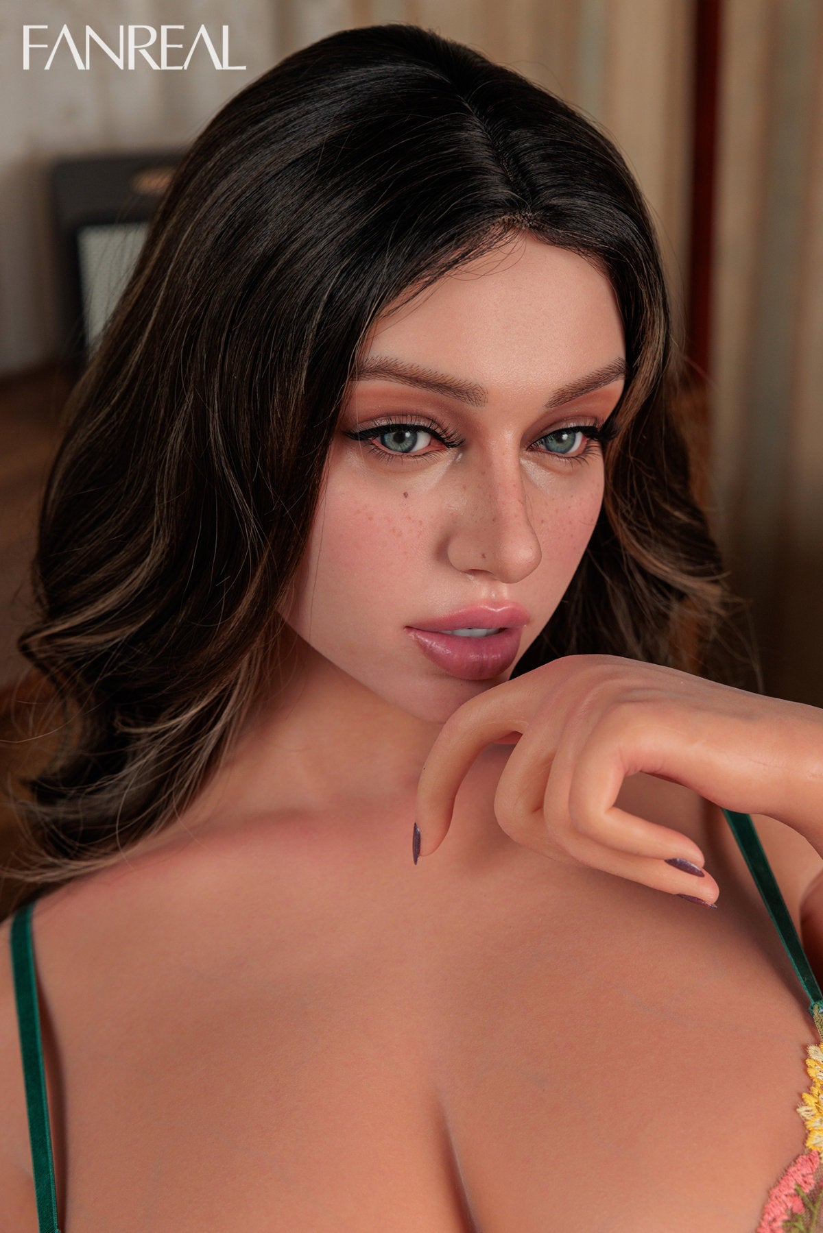 FANREAL DOLL T95 CM G Silicone Torso - Lila V4 upper body front view in green lace bra, long dark wavy hair, warm indoor background
