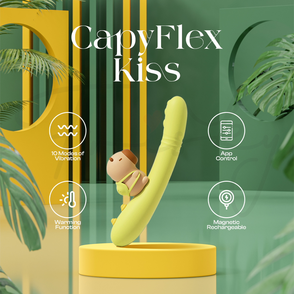 Flexible suction vibrator standing upright on yellow pedestal with tropical leaf background