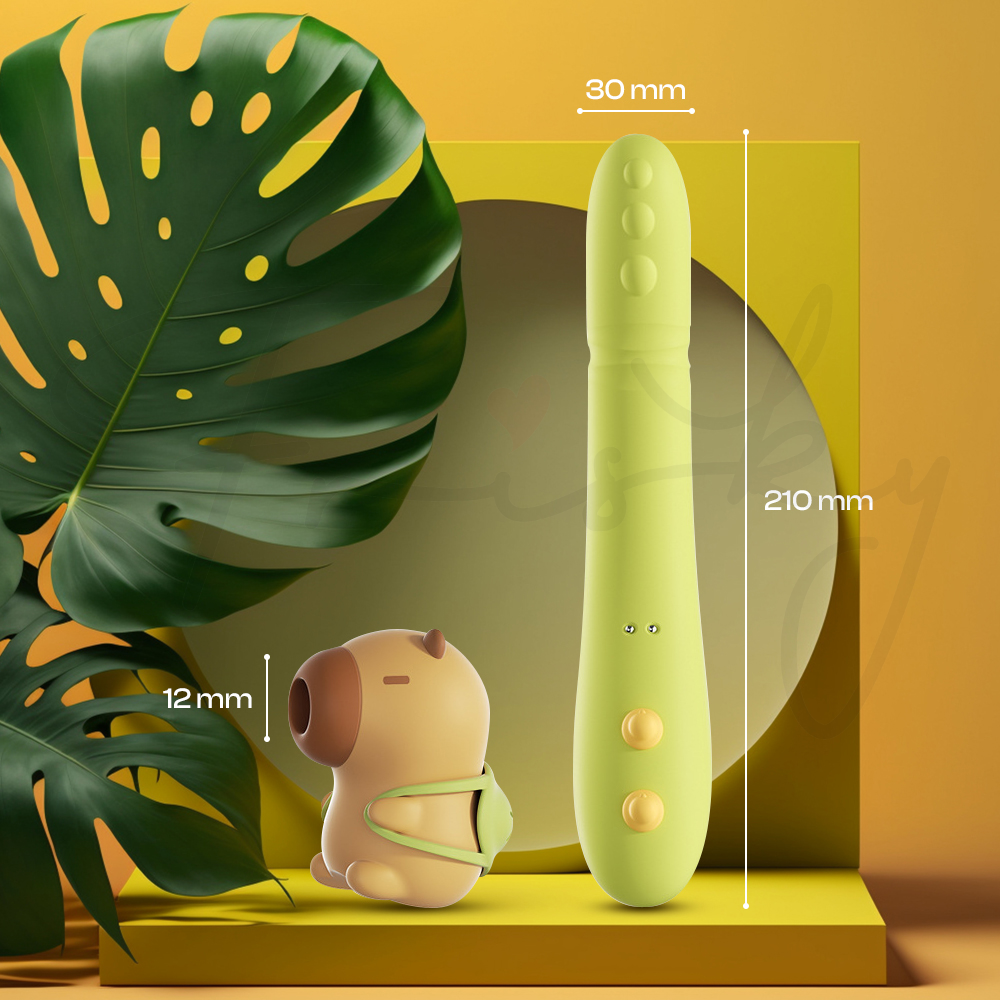 Curved vibrator design shown beside tropical leaves highlighting sleek body shape