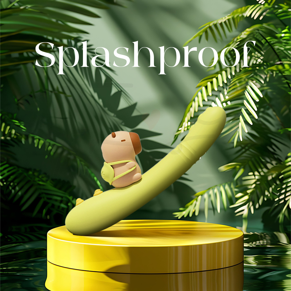 Splashproof suction vibrator displayed on stand with green jungle-inspired background