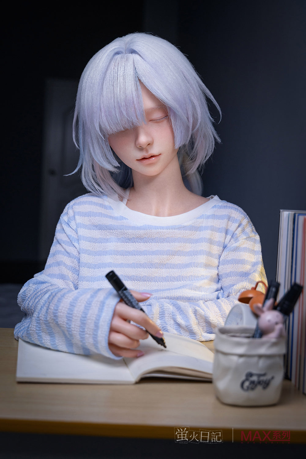 Figurine of Firefly Diary Doll 153 cm A Max Series Silicone - Liuli V2  with light purple hair wearing a striped shirt, holding pens and a notebook.