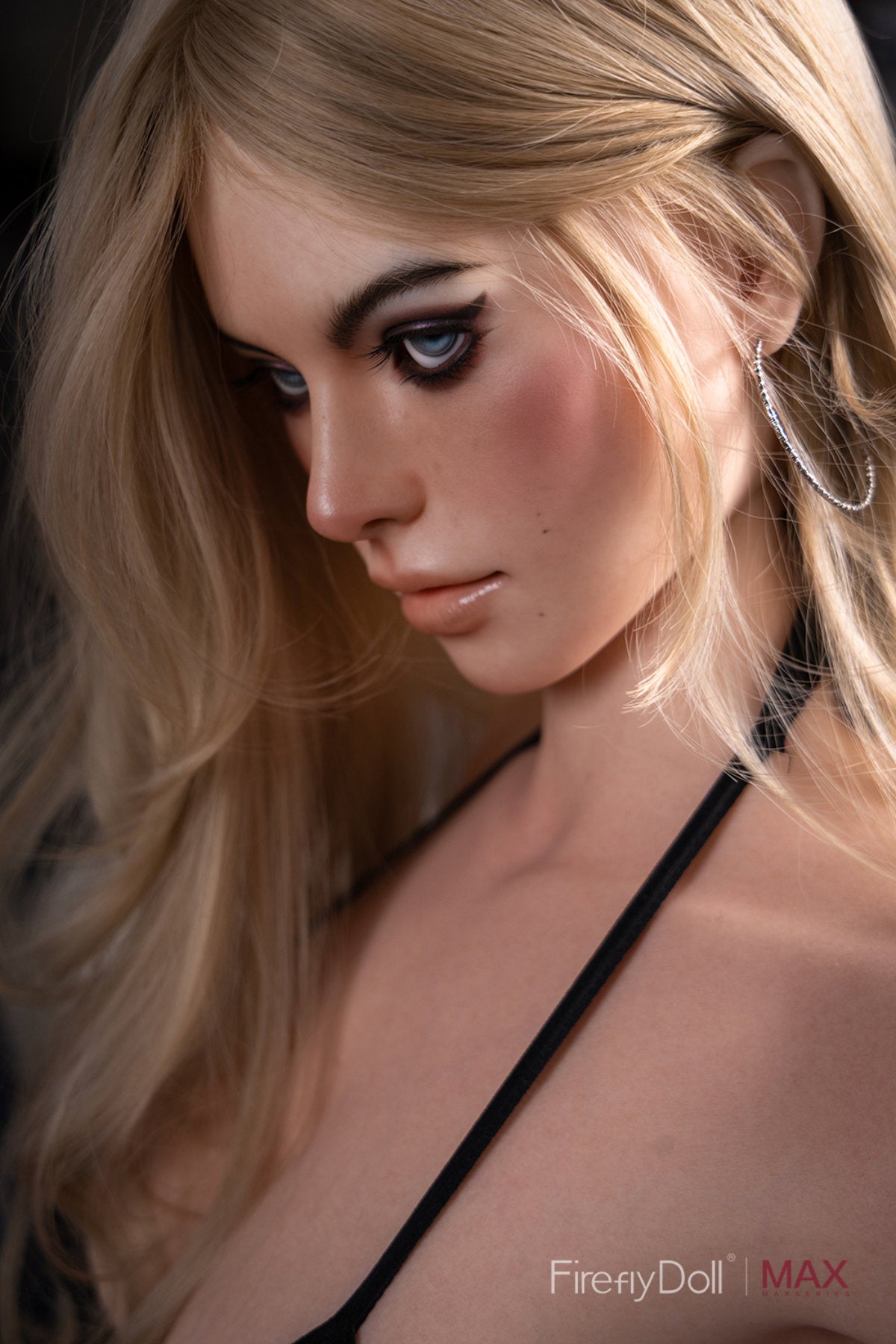Firefly Diary Doll 158 cm F Max Series Silicone - Chloe three-quarter view in black soccer ball print bikini, long blonde hair, indoor sports bar background
