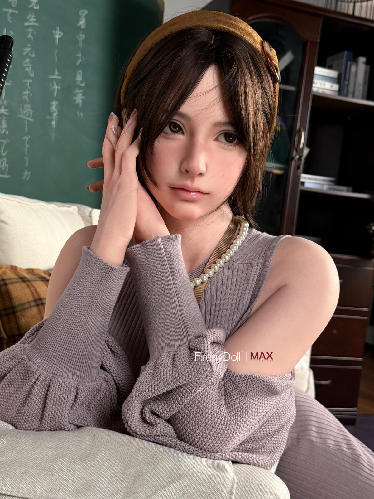 Firefly Diary Doll 165 cm B Max Series Silicone - Haruko V2 seated close-up in a gray knit sweater dress, hand near her hair