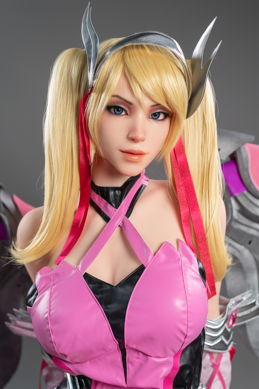 Game Lady 171 cm G Silicone - Mercy in a pink and black outfit with horns headdress.