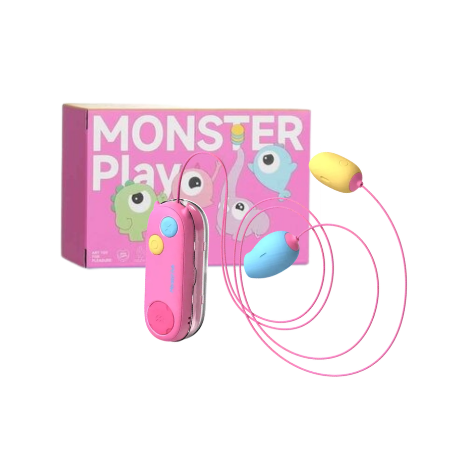 Pink wireless dual egg vibrator with remote control beside colorful Monster Play box