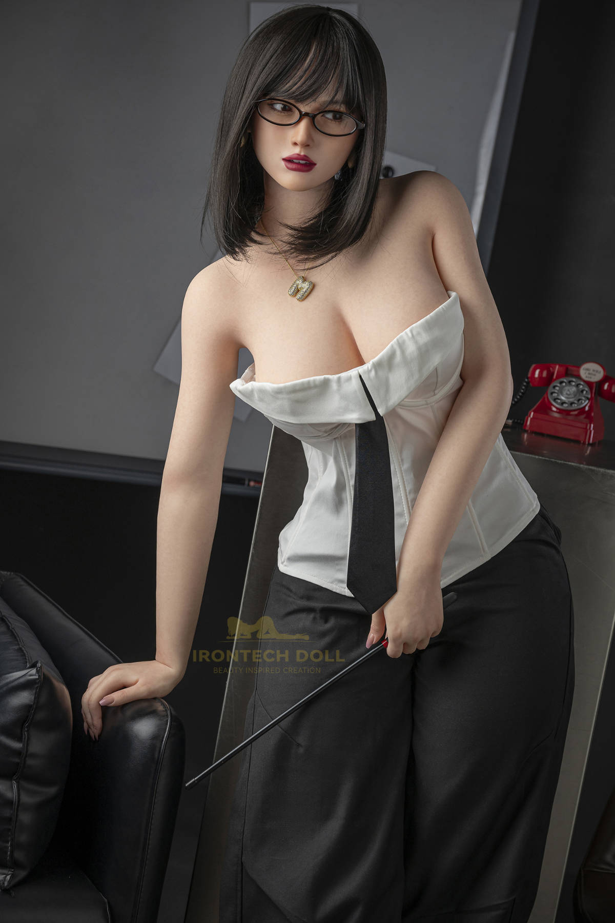 Irontech Doll 164 cm E Silicone - Miya V2 upper body front view in white off-shoulder corset top with black necktie, long dark hair with bangs, dark studio background
