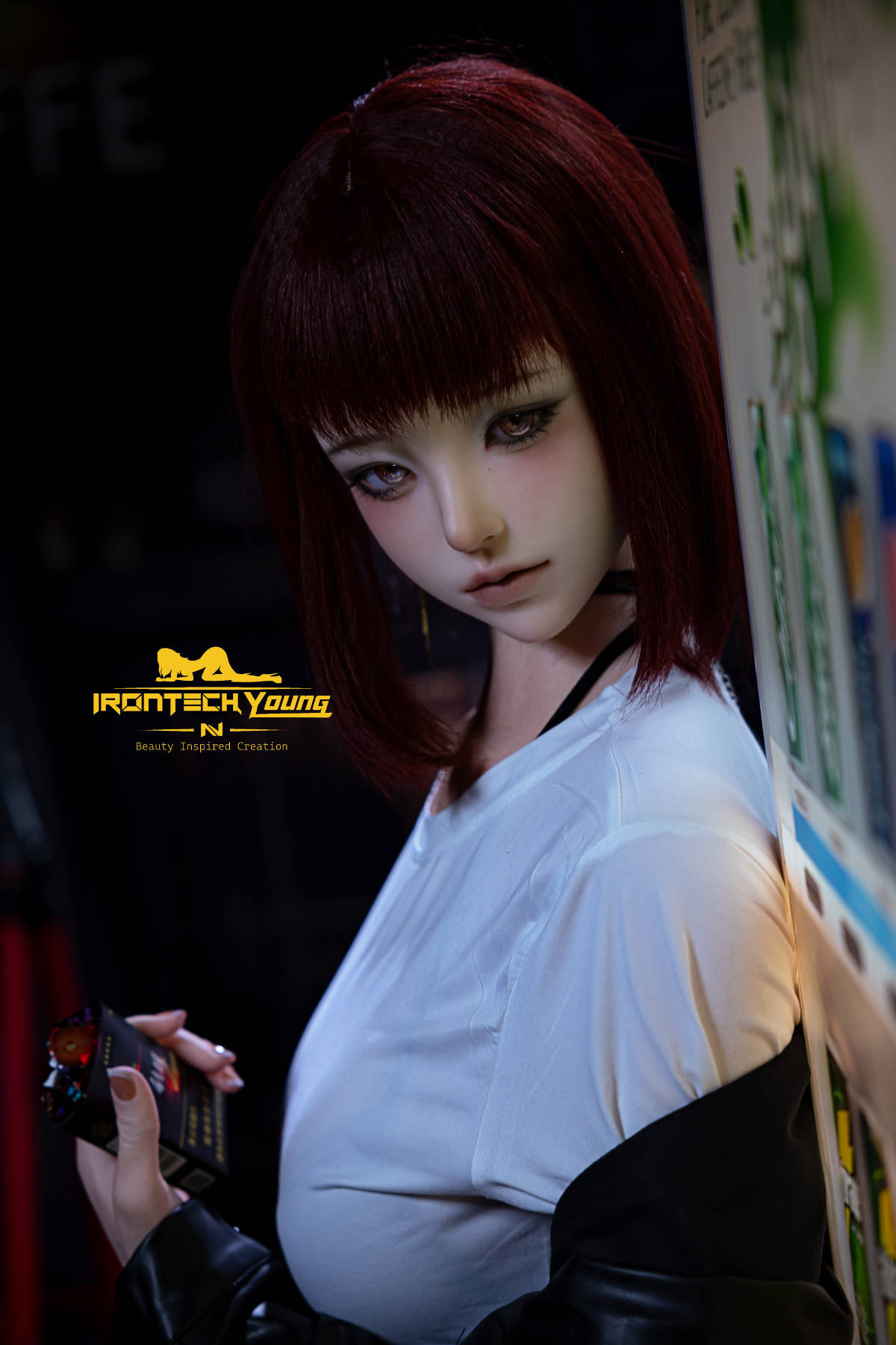 Irontech Doll 171 cm D Young Series Silicone - Ria – close-up in a white tee and leather jacket under moody city lights