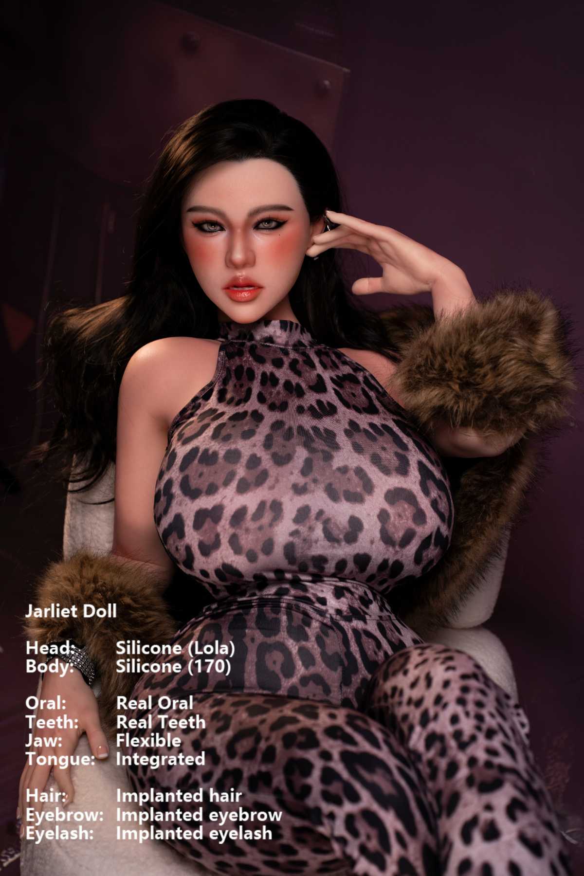 Jarliet Doll 170 cm G Silicone - Lola wearing a leopard print sexy jumpsuit with fur trim, seated on a cream couch, dark purple background.