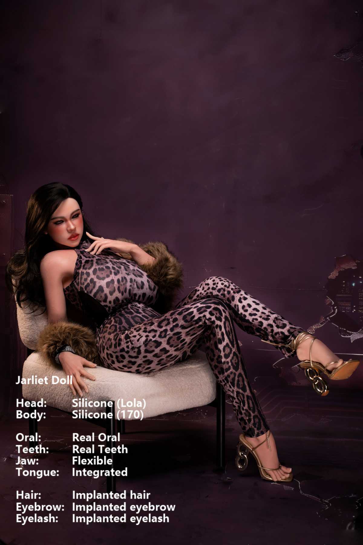Jarliet Doll 170 cm G Silicone - Lola wearing a leopard print sexy jumpsuit with fur trim and gold heels, sitting pose on a cream chair, dark violet background.