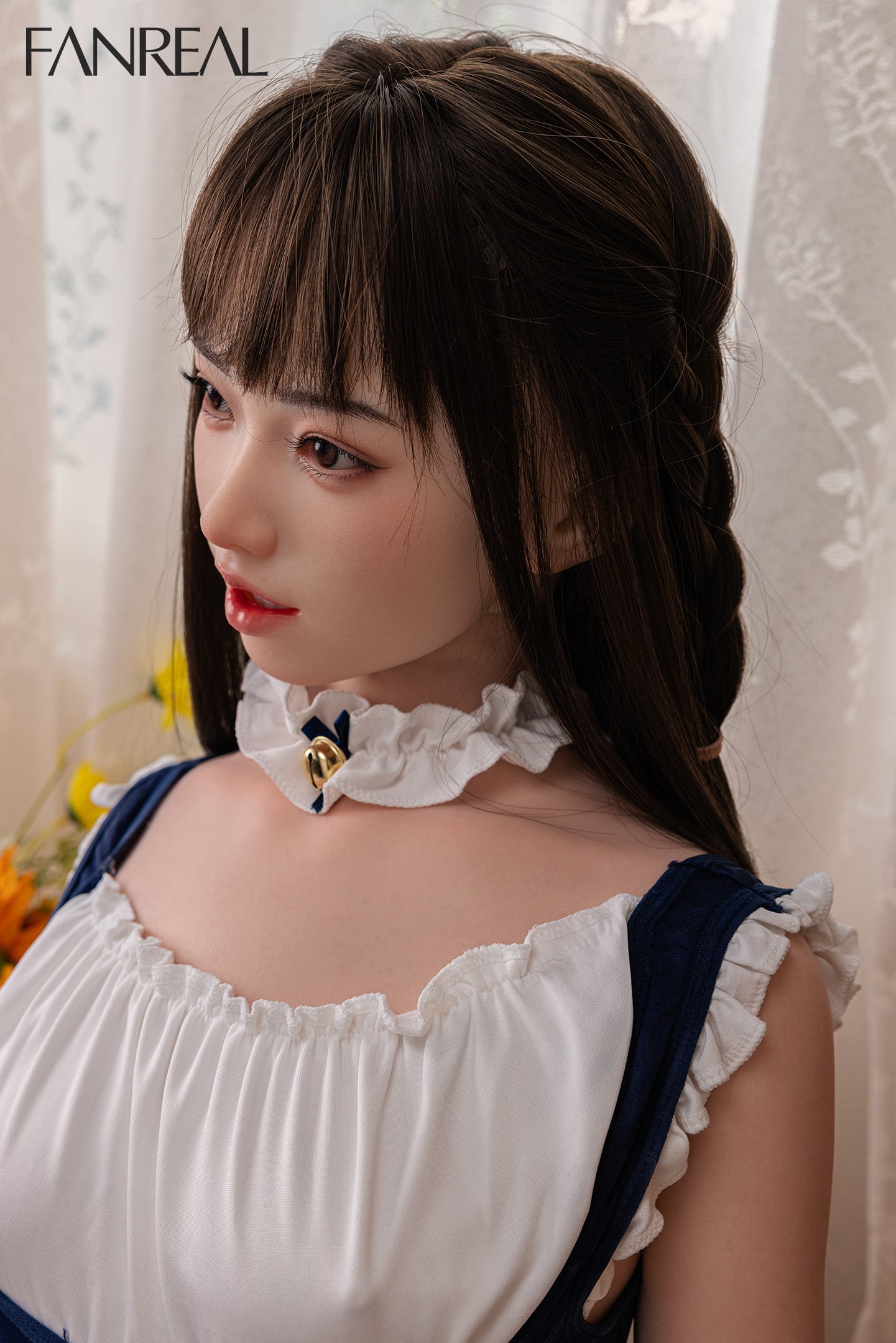 Close-up of FANREAL Doll Molly V3 – 153cm B-Cup Realistic Silicone Sex Doll’s face and upper body, showing detailed features and a blue and white maid outfit.