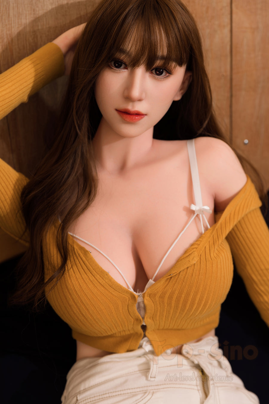Top Sino 169 cm Platinum Silicone - Nanatsumori Riri (RRS+) wearing a mustard yellow top with long brown hair.