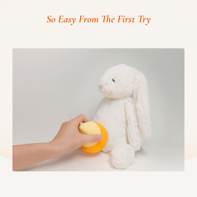 Close-up of Osuga Tiltap soft silicone tapping massage head