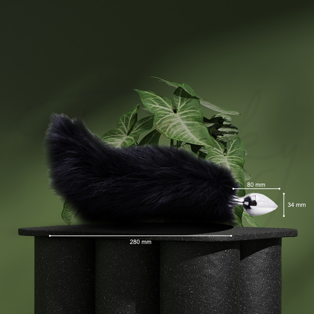 Electric fox tail anal plug showcased with atmospheric green lighting and soft faux fur.
