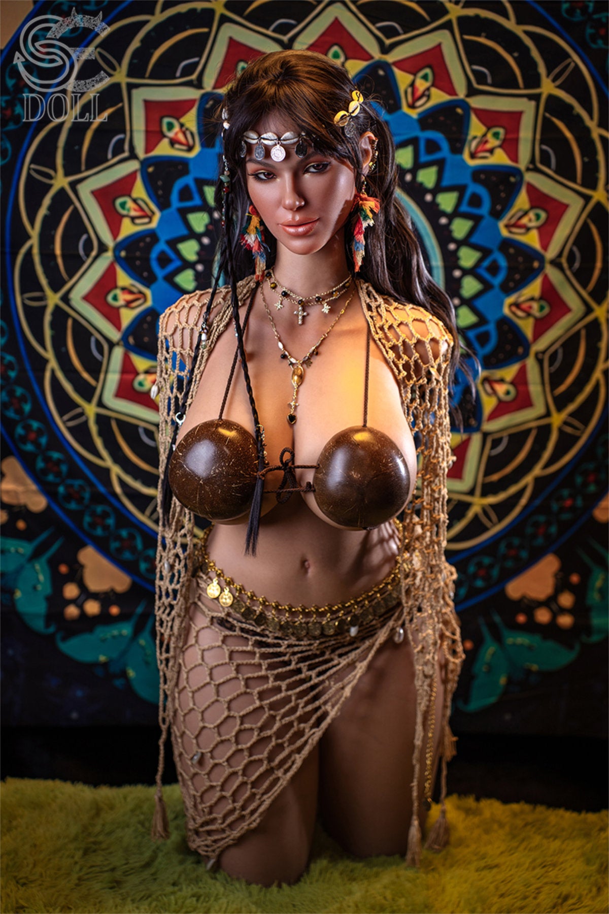 SEDOLL T111 cm G Silicone Torso - Aria Knox.B upper body side view in brown tribal coconut shell bra with gold jewelry, long dark hair, colorful mosaic background
