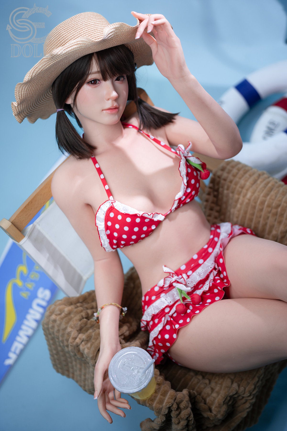 SEDOLL T159cm A Aya Series Silicone - Airi.A – Seated pose with straw hat, red polka-dot bikini set, dark bangs and long hair down, blue backdrop with beach props.