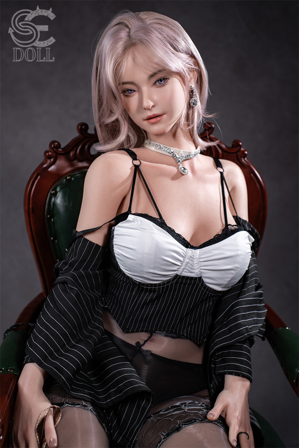 SEDOLL T160 cm C Aya Series Silicone - Shion.B wearing a black and white office attire sitting in a chair.