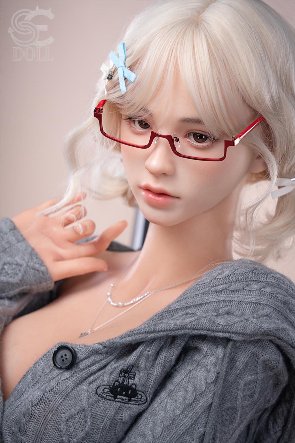 SEDOLL T161 cm C Aya Series Silicone - Miki.B close-up with hand near her chin, red glasses, off-shoulder gray sweater