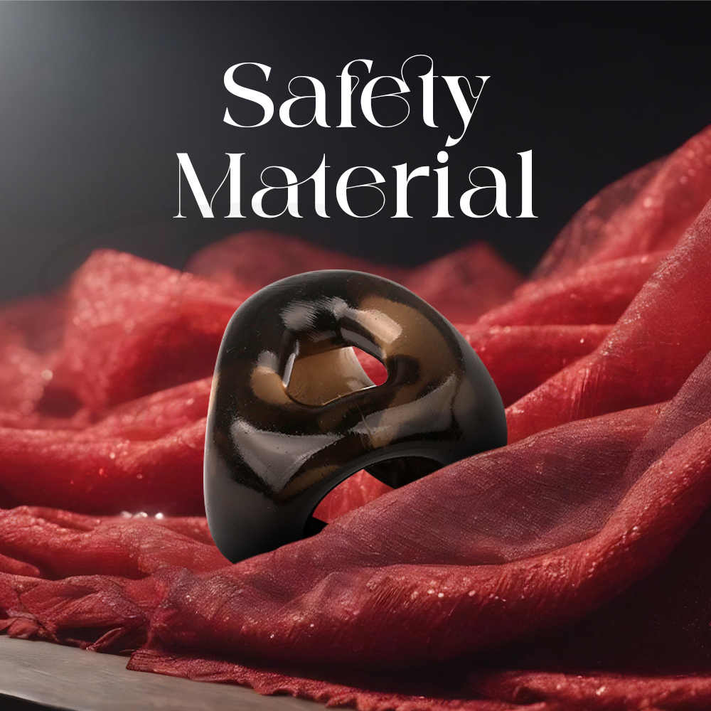 Soft body-safe material grip ring resting on fabric to show gentle texture