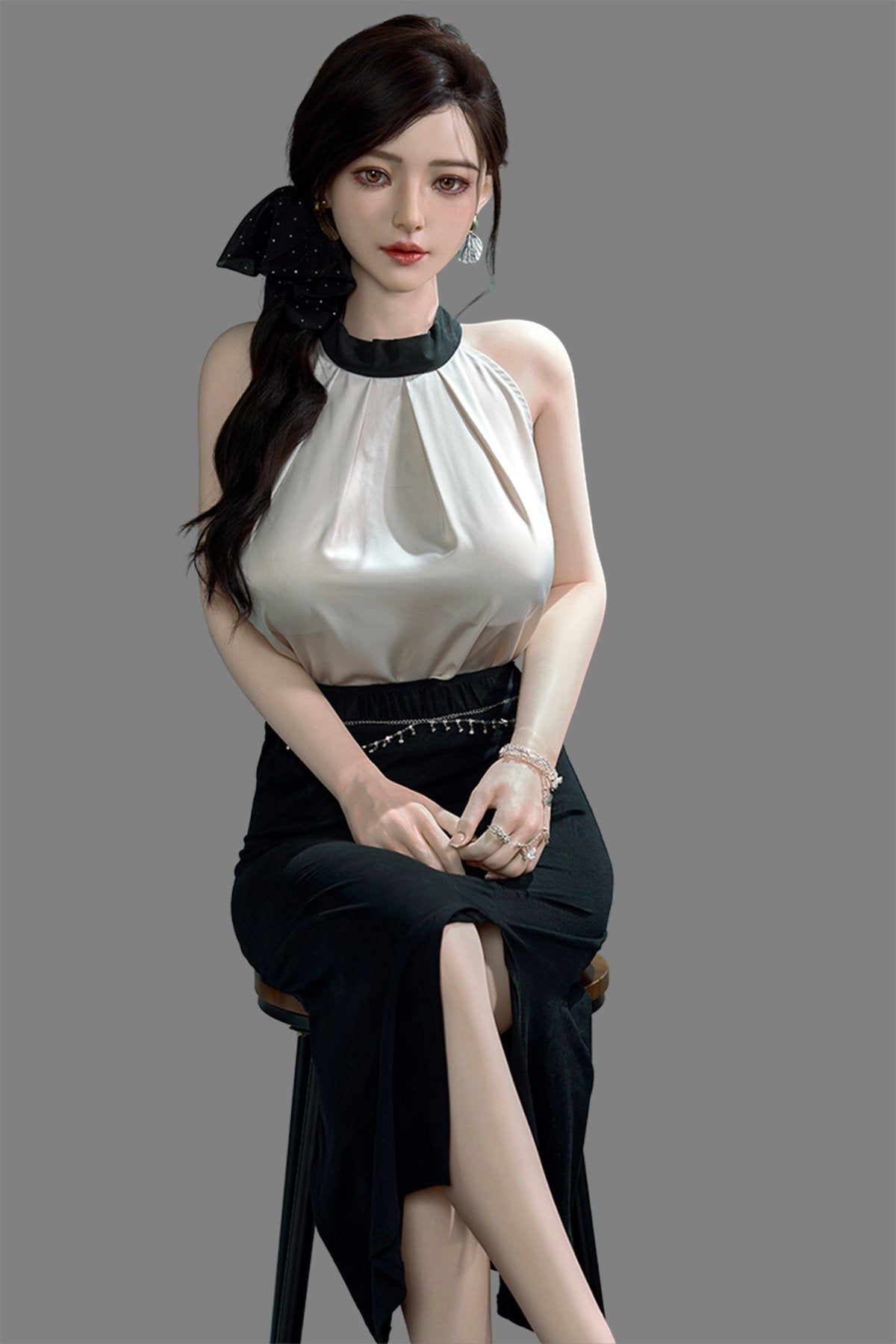 Starpery 171cm D - Asuka Eva – Seated pose, cream halter top with black skirt, dark hair in half-up style, plain grey backdrop.