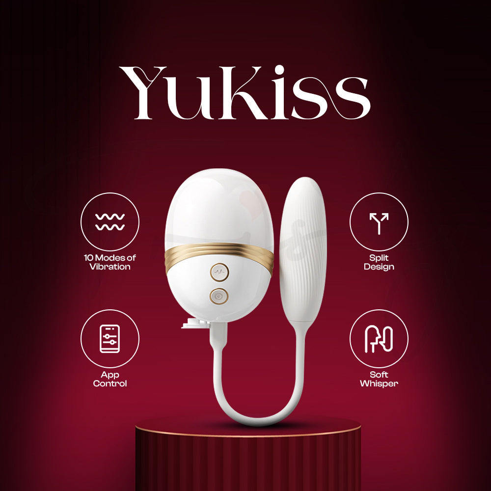 YuKiss dual-function pleasure device displayed with elegant red luxury presentation background