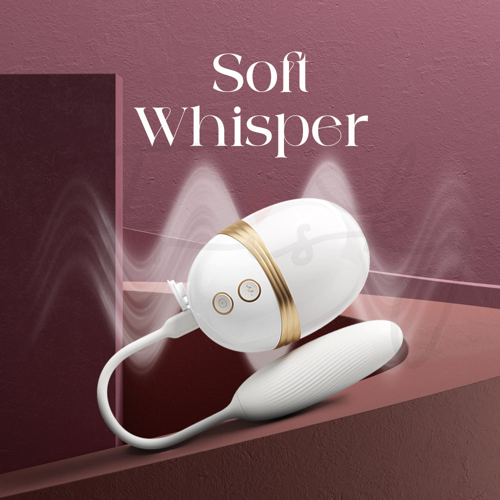 Whisper-quiet vibrator resting on silky fabric with soft glowing visual accents