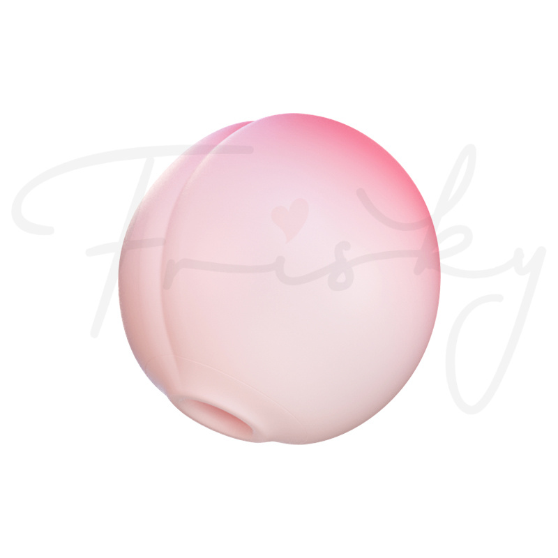 Peach-shaped stimulator shown at an angle on a plain white background