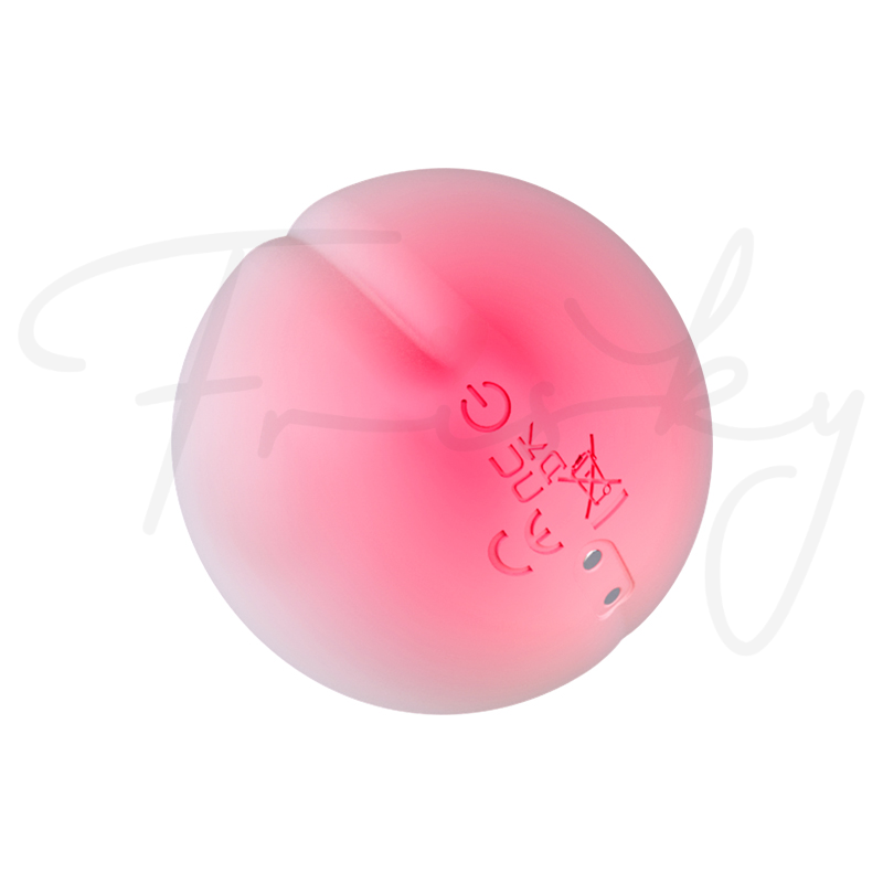 Peach-shaped stimulator in pink and coral ombre on a plain white background