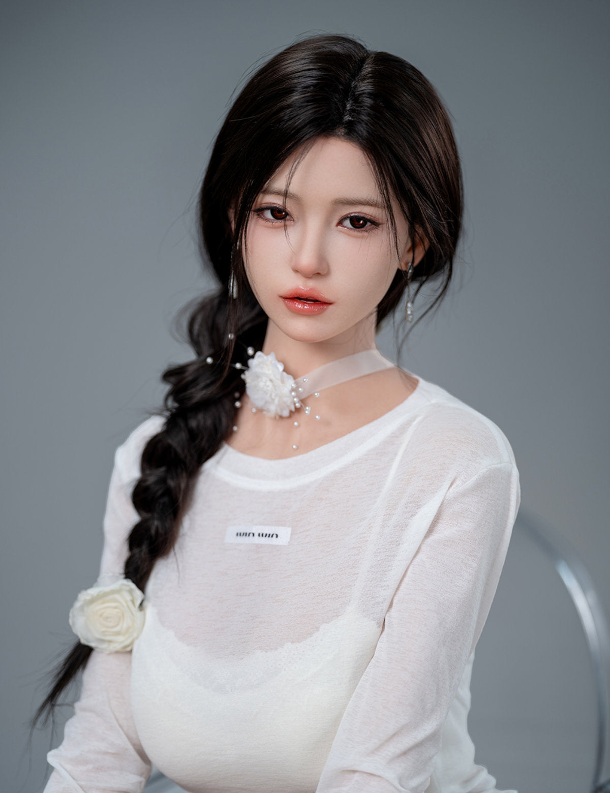 TOP-CYDOLL 168cm F-Cup Liang Realistic Sex Doll close-up portrait view with long dark braided hair and pearl necklace accessory, showcasing realistic oriental facial features.