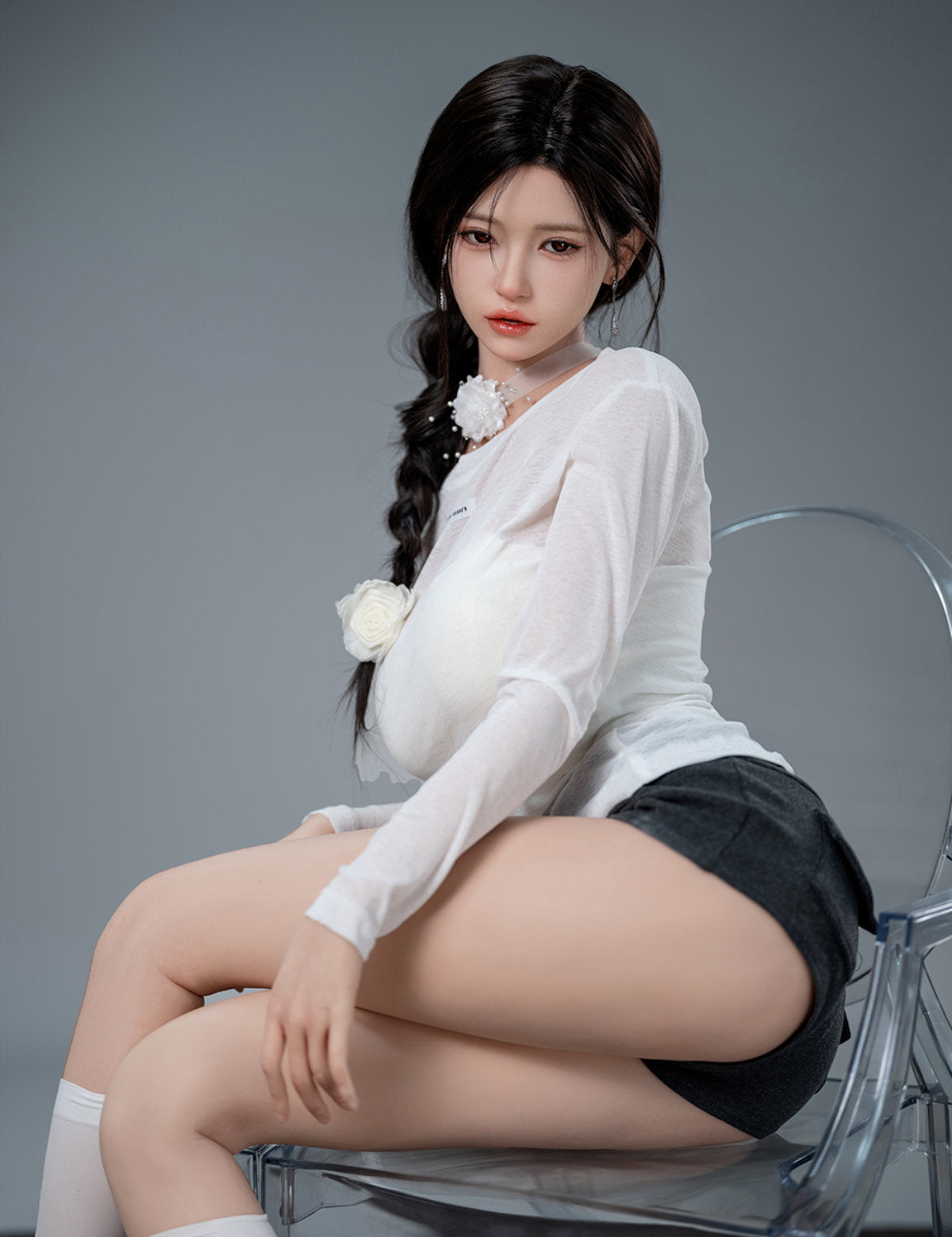 TOP-CYDOLL 168cm F-Cup Liang Realistic Sex Doll rear three-quarter view in white top and dark shorts, showcasing natural body proportions against grey background
