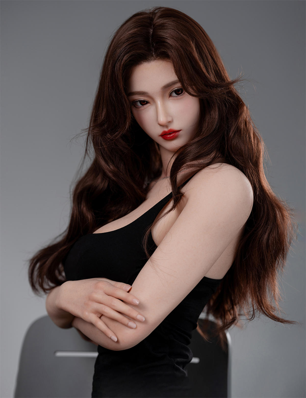 TOP-CYDOLL 168cm F-Cup Rinka Realistic Sex Doll standing close-up with arms crossed, fitted black dress, wavy auburn hair falling over one shoulder