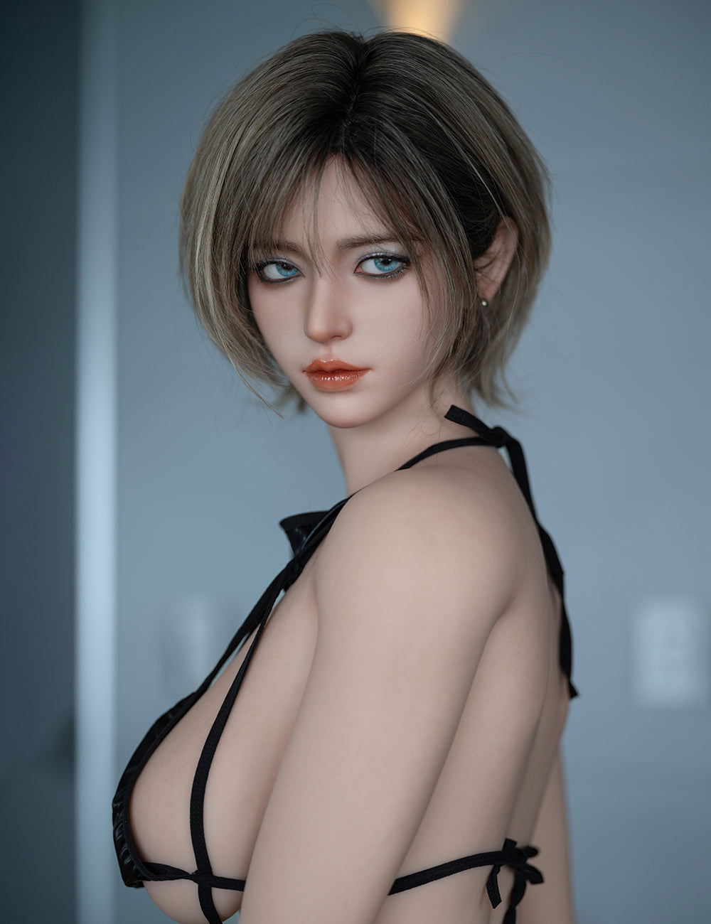TOP-CYDOLL 168cm F-Cup Wan V2 Realistic Sex Doll wearing a black strappy top against a bathroom 
background