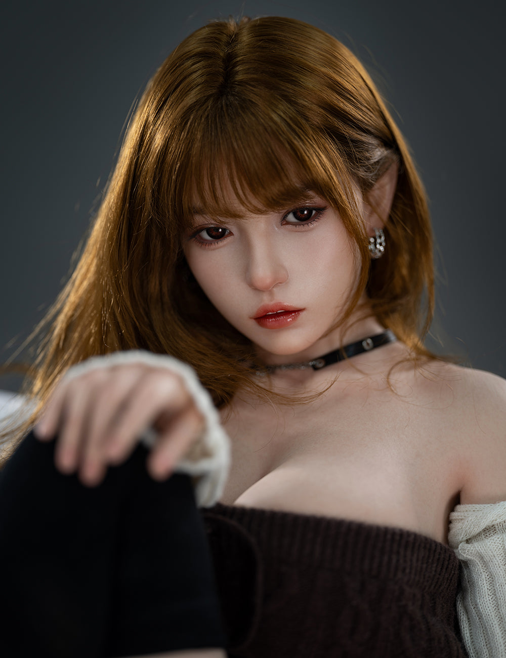 TOP-CYDOLL 157cm D-Cup Liang Realistic Sex Doll with long brown hair wearing a dark outfit against a gray background