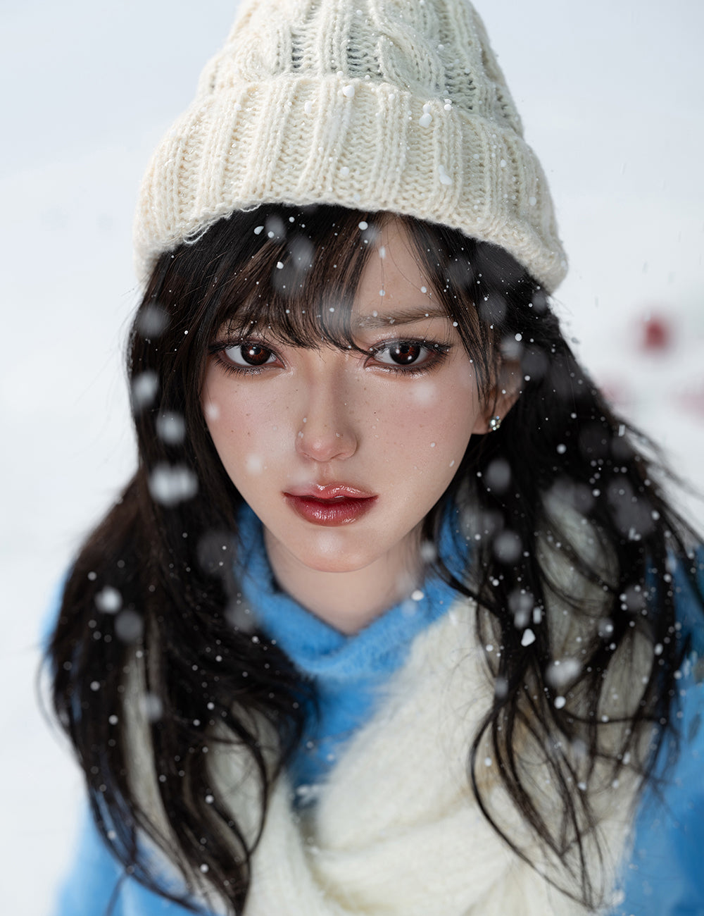 Close-up shot of TOP-CYDOLL 168cm F-Cup Bingbing Realistic Sex Doll with a snow in a white background.
