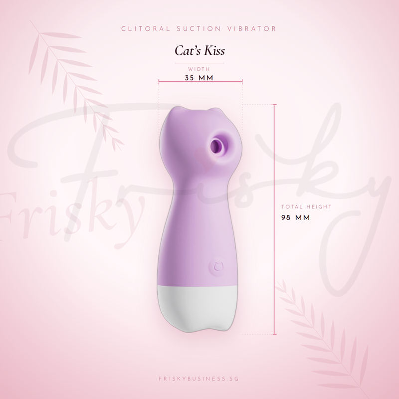 Purple mini vibrator shown against a pink background with leaf accents