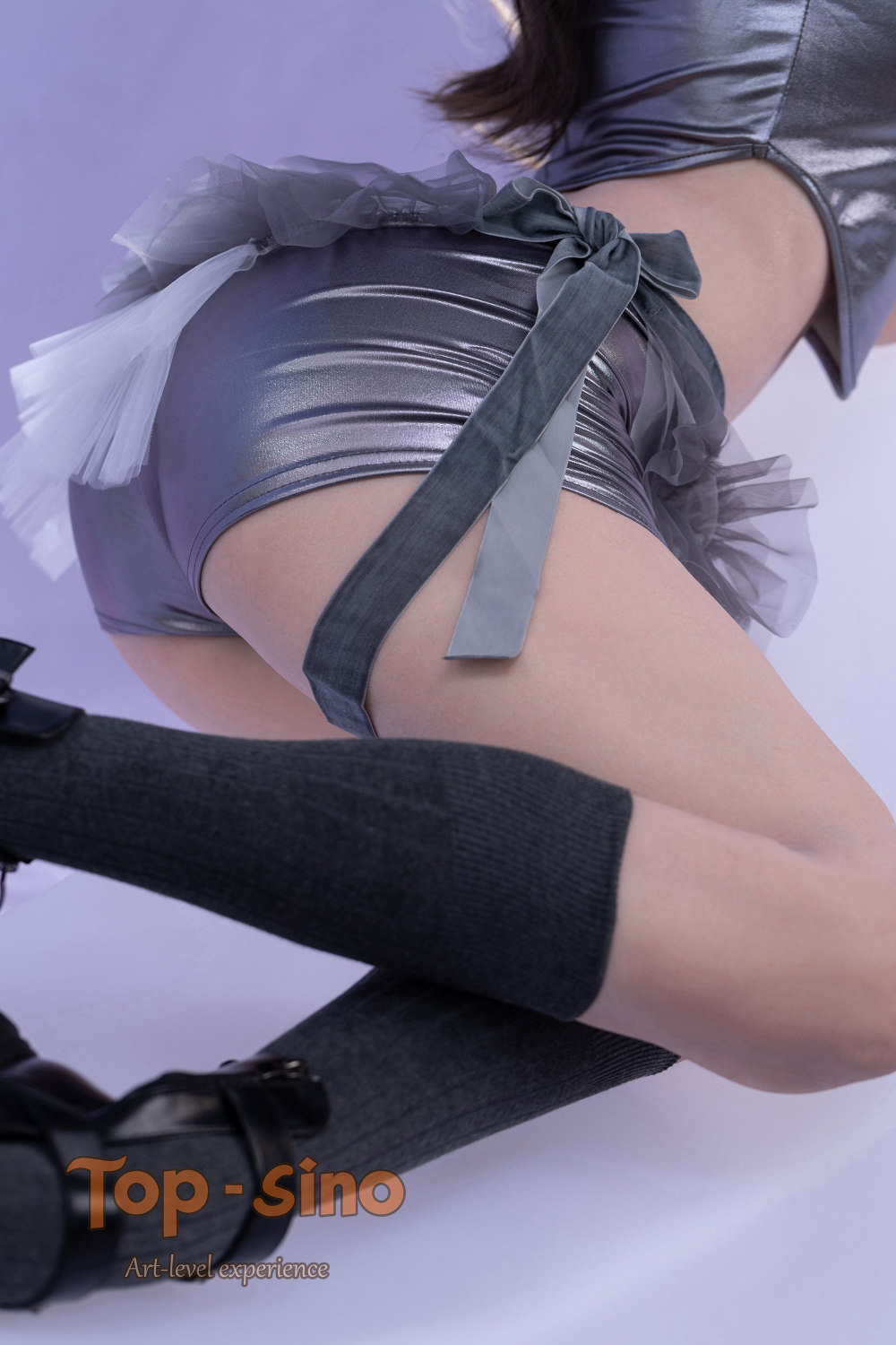 Top Sino 167 cm Platinum Silicone - Mimu (RRS+) - V3 wearing a shiny silver top with sexy short outfit and black knee-high socks.