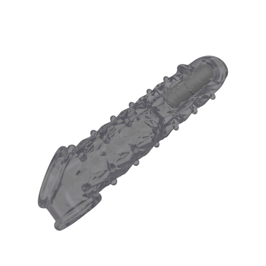 Transparent textured sleeve extender with detailed bumps and tapered tip for enhanced stimulation