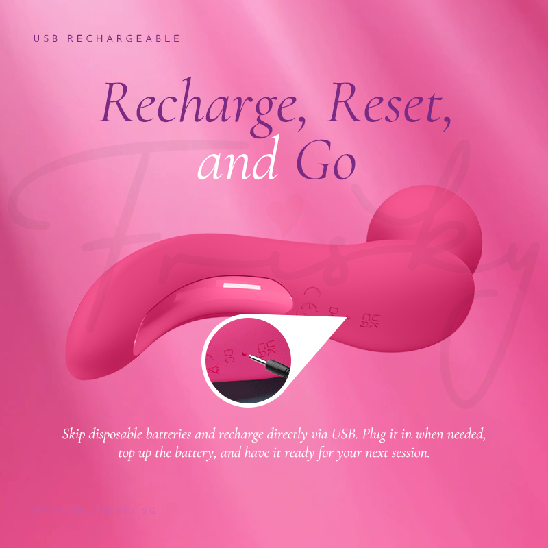 Vibrator shown with its charging cable on a pink and cream background.