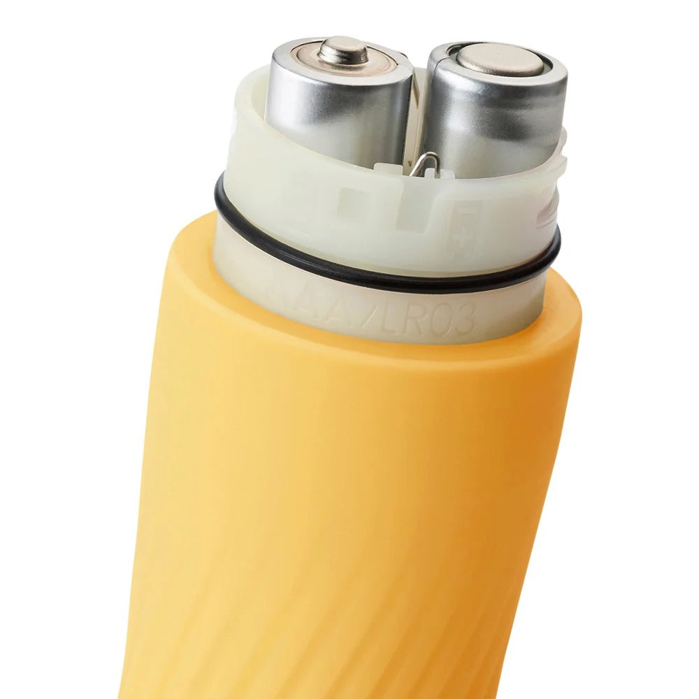 Iroha Zen Hanacha yellow massager held showing ribbed texture