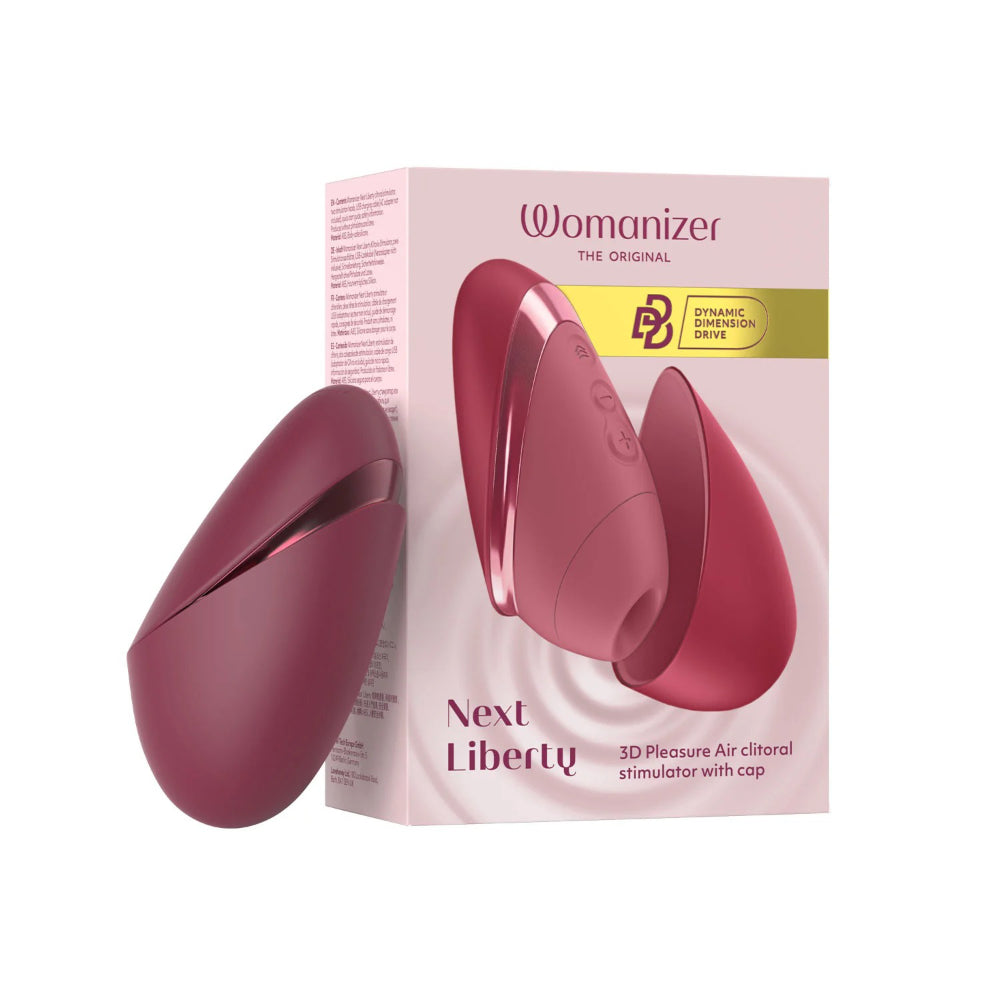 Womanizer Next Liberty positioned next to its elegant retail box for presentation.