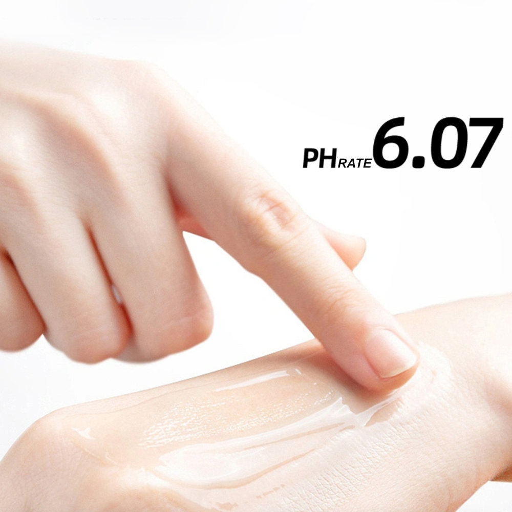 Close-up of a smooth swipe of lubricant on skin with a pH 6.07 label
