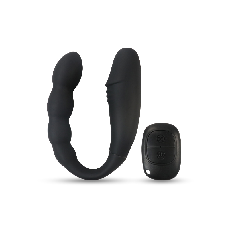 Black U-shaped dual-motor vibrator with ribbed ridges beside its small round remote on white