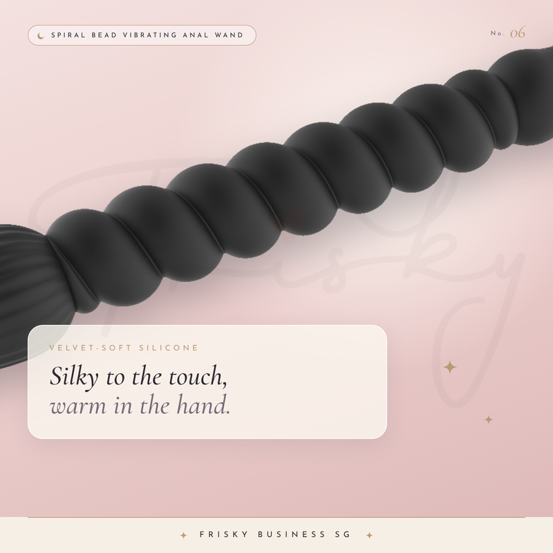 Close-up of the black spiral beads on a pink background with a short caption card